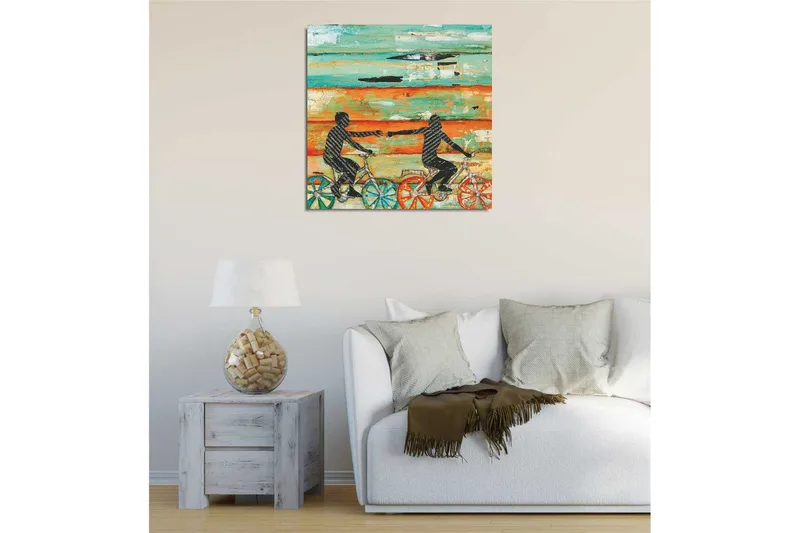 Canvastavla 45x45 cm - Cyklande personer som sträcker ut händerna mot varandra - Turkos / Orange / Svart - Inredning - Tavlor & posters - Canvastavla