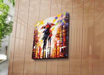 Canvastavla 45x45 cm - Silhuett av en person med paraply i en färgglad stadsmiljö - Röd / Orange / Svart - Inredning - Tavlor & posters - Canvastavla