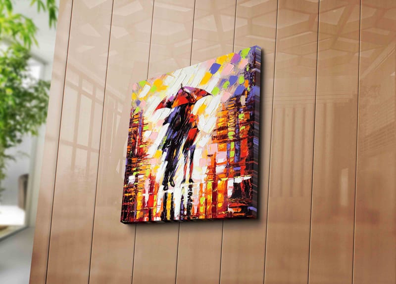 Canvastavla 45x45 cm - Silhuett av en person med paraply i en färgglad stadsmiljö - Röd / Orange / Svart - Inredning - Tavlor & posters - Canvastavla