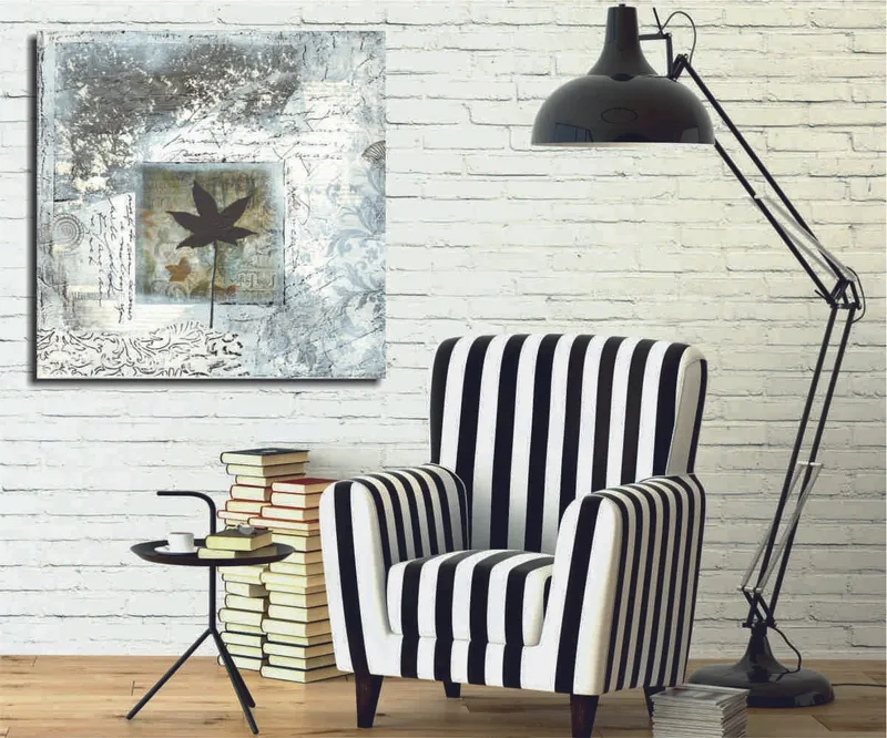 Canvastavla 45x45 cm - Silhuett av ett löv mot en abstrakt bakgrund, Svart / Blå / Grön