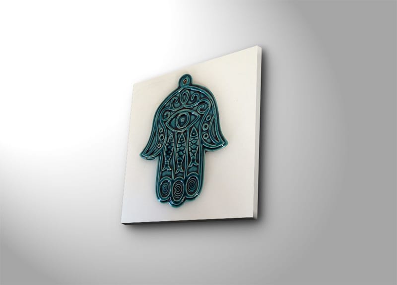 Canvastavla 45x45 cm - Symbolisk hand med öga och intrikata mönster, Turkos / Vit