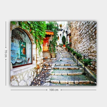 Canvastavla 70x100 cm - Charmig gränd med stenar och grönska som leder uppåt, omgiven av historiska byggnader - Grön / Beige / Orange - Inredning - Tavlor & posters - Canvastavla