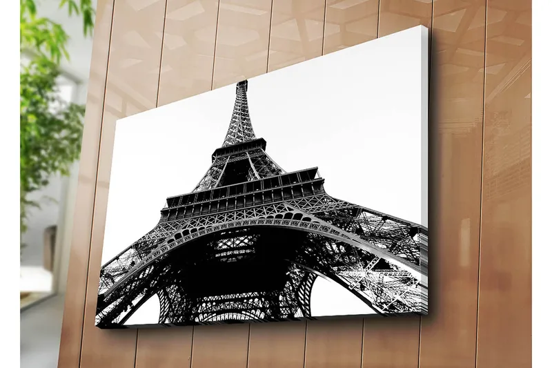 Canvastavla 70x100 cm - Dramatisk vy av Eiffeltornet sedd från marken uppåt - Svart / Vitt - Inredning - Tavlor & posters - Canvastavla