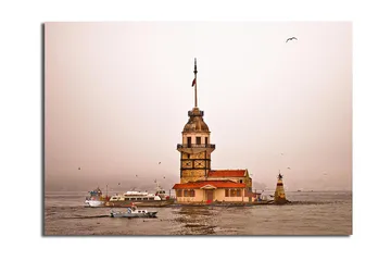 Canvastavla 70x100 cm - Ett historiskt fyrtorn som reser sig över vattnet i en dimmig atmosfär - Beige / Orange / Brun - Inredning - Tavlor & posters - Canvastavla