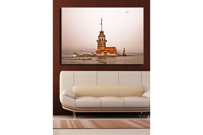Canvastavla 70x100 cm - Ett historiskt fyrtorn som reser sig över vattnet i en dimmig atmosfär - Beige / Orange / Brun - Inredning - Tavlor & posters - Canvastavla