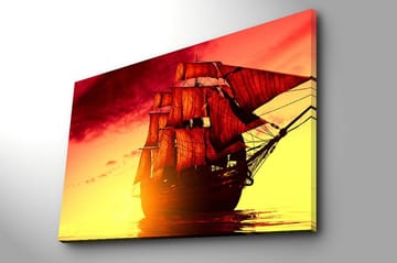 Canvastavla 70x100 cm - Ett majestätiskt segelfartyg med röda segel som navigerar genom en gyllene solnedgång - Röd / Orange / Gul - Inredning - Tavlor & posters - Canvastavla
