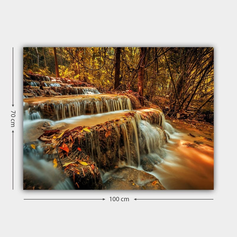 Canvastavla 70x100 cm - Ett vackert vattenfall som rinner ner för flera nivåer i en höstfärgad skog - Guld / Brunt / Orange - Inredning - Tavlor & posters - Canvastavla