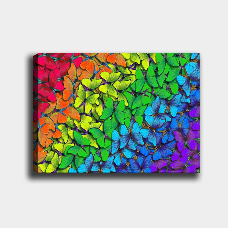 Canvastavla 70x100 cm - Färgglad samling av fjärilar i olika nyanser som skapar en livfull och harmonisk komposition, Grön / Blå / Orange