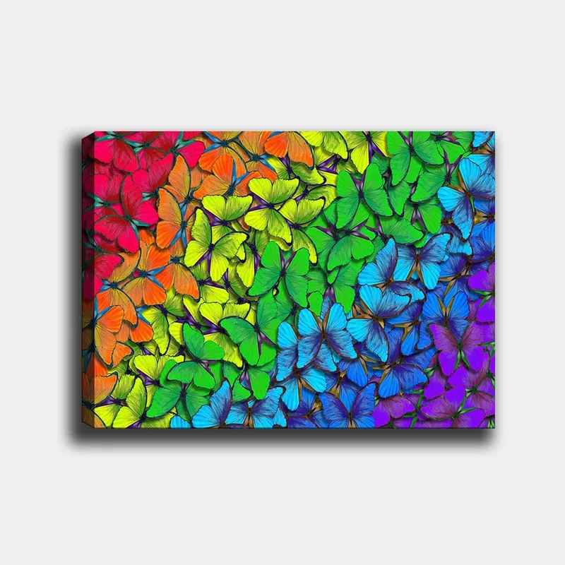 Canvastavla 70x100 cm - Färgglad samling av fjärilar i olika nyanser som skapar en livfull och harmonisk komposition, Grön / Blå / Orange