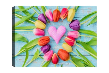 Canvastavla 70x100 cm - Färgglad samling av tulpaner i form av ett hjärta med en rosa prydnad i mitten - Rosa / Lila / Orange - Inredning - Tavlor & posters - Canvastavla