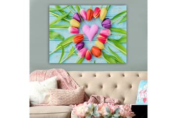 Canvastavla 70x100 cm - Färgglad samling av tulpaner i form av ett hjärta med en rosa prydnad i mitten - Rosa / Lila / Orange - Inredning - Tavlor & posters - Canvastavla