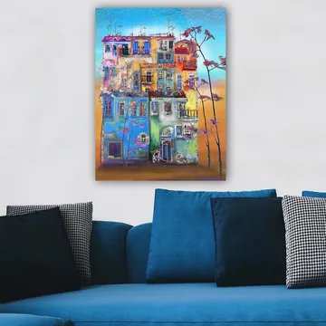 Canvastavla 70x100 cm - Färgglada hus i en urban miljö med blommande träd i förgrunden - Blå / Grön / Orange - Inredning - Tavlor & posters - Canvastavla