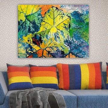Canvastavla 70x100 cm - Färgglada löv i olika nyanser som skapar en livfull och abstrakt komposition - Gul / Grön / Orange - Inredning - Tavlor & posters - Canvastavla