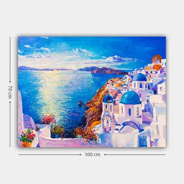 Canvastavla 70x100 cm - Färgstark vy över en grekisk kuststad med vita byggnader och blå kupoler som sträcker sig mot havet - Blå / Vit / Orange - Inredning - Tavlor & posters - Canvastavla