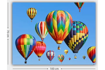 Canvastavla 70x100 cm - Flera färgglada varmluftsballonger sväva i en klar blå himmel - Röd / Grön / Gul - Inredning - Tavlor & posters - Canvastavla