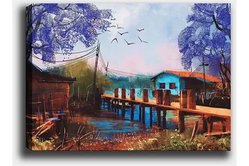 Canvastavla 70x100 cm - Idyllisk landskapsmålning med en brygga som sträcker sig över en stilla vattenyta, omgiven av färgglada hus och träd i lila nyanser - Lila / Blå / Brun - Inredning - Tavlor & posters - Canvastavla