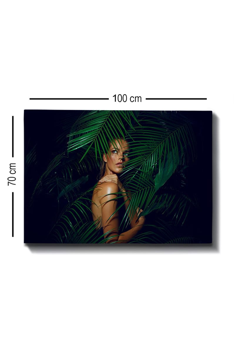 Canvastavla 70x100 cm - Kvinna delvis dold bakom gröna palmblad - Mörkgrön / Ljusgrön / Beige - Inredning - Tavlor & posters - Canvastavla