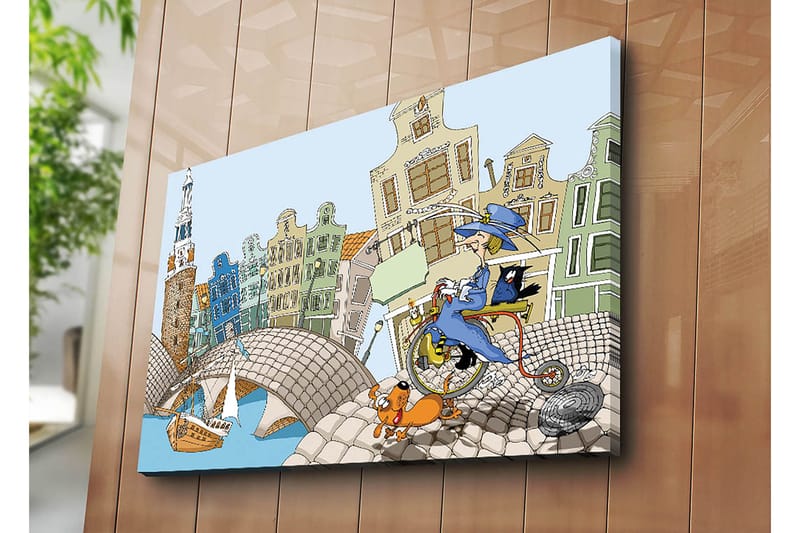 Canvastavla 70x100 cm - Kvinna på en cykel med en hund och en katt, omgiven av färgglada hus och en bro - Blå / Grön / Orange - Inredning - Tavlor & posters - Canvastavla