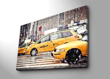 Canvastavla 70x100 cm - Livlig stadsbild med gula taxibilar som kör genom snöfall i New York City - Gul / Svart - Inredning - Tavlor & posters - Canvastavla