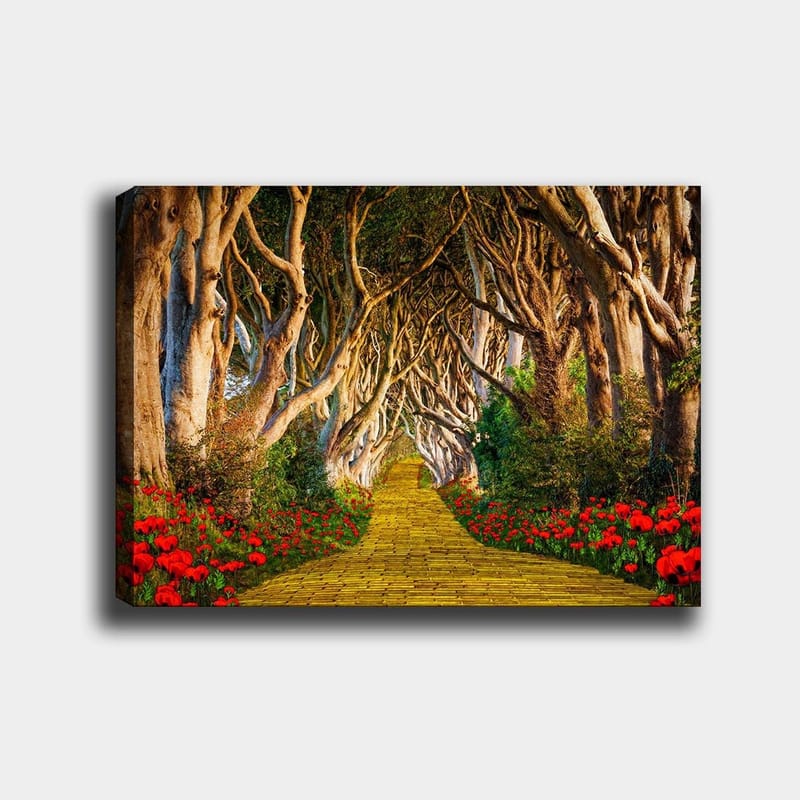 Canvastavla 70x100 cm - Magisk väg kantad av blommor som leder genom en tunnel av träd, Gult / Grönt / Rött