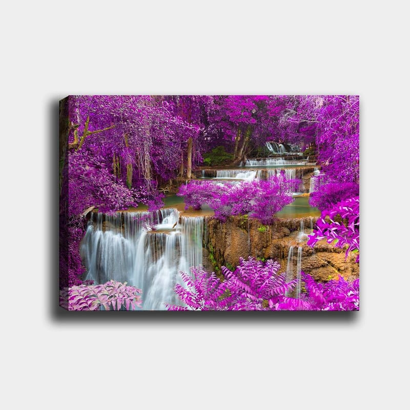 Canvastavla 70x100 cm - Magisk vattenfallsscen omgiven av lila blommor och grönska, Lila / Grön / Vit