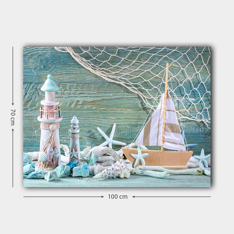 Canvastavla 70x100 cm - Maritim scen med en segelbåt, fyrtorn och sjöstjärnor i en strandmiljö - Blå / Vit / Beige - Inredning - Tavlor & posters - Canvastavla