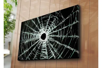 Canvastavla 70x100 cm - Närbild av en sprucken glasruta med ett centralt hål och sprickor som sträcker sig utåt - Svart / Genomskinlig - Inredning - Tavlor & posters - Canvastavla