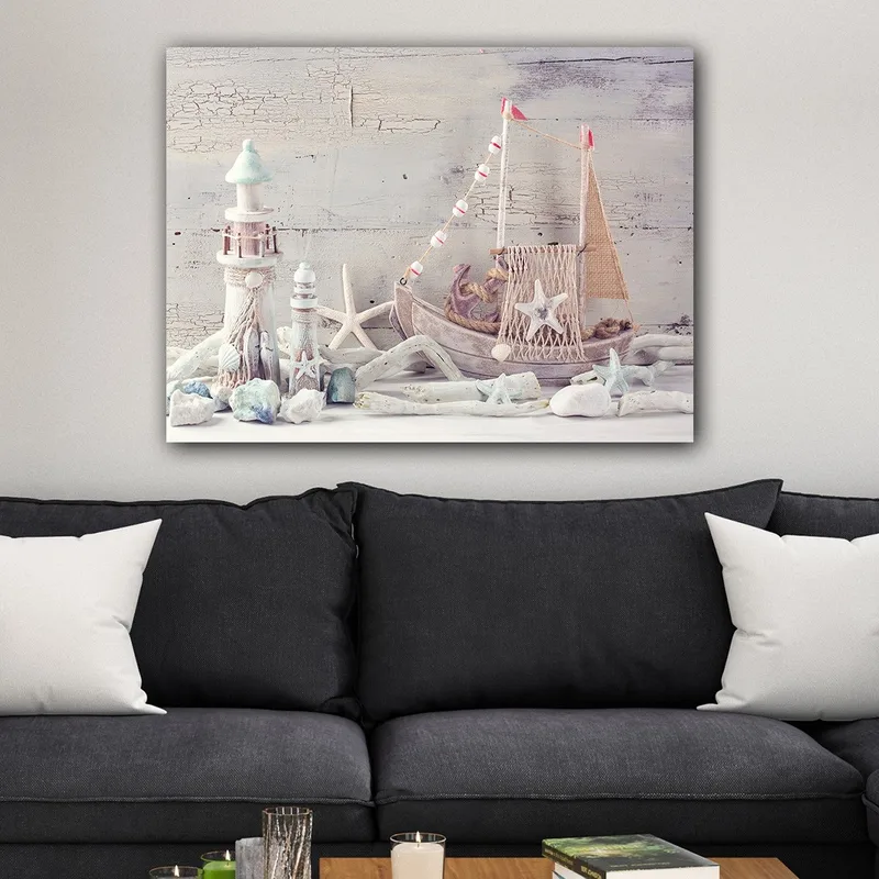 Canvastavla 70x100 cm - Nautisk komposition med en båt, sjöstjärnor och lanternor i en maritim stil, Blå / Vit / Beige