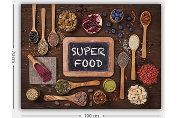 Canvastavla 70x100 cm - Samling av superfoods arrangerade på en träyta med en tavla som visar texten SUPER FOOD - Röd / Grön / Svart - Inredning - Tavlor & posters - Canvastavla
