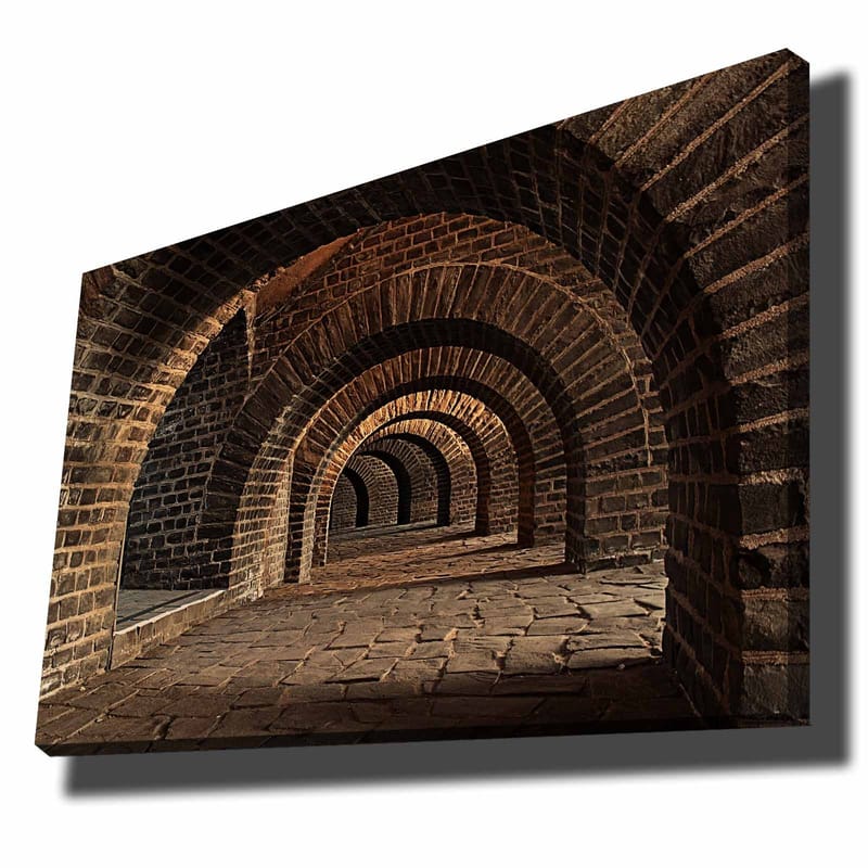Canvastavla 70x100 cm - Serie av valv i en gammal stenstruktur som skapar en känsla av djup och perspektiv, Mörkbrun / Grå / Beige