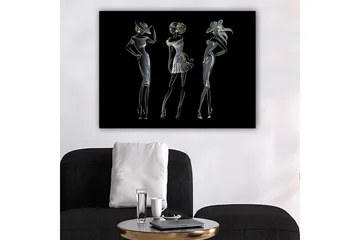 Canvastavla 70x100 cm - Silhuetter av tre eleganta kvinnor i modekläder - Svart / Guld / Vit - Inredning - Tavlor & posters - Canvastavla