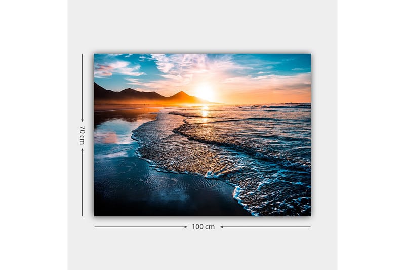 Canvastavla 70x100 cm - Solnedgång över en strand med mjuka vågor som rullar in mot kusten - Blå / Orange / Turkos - Inredning - Tavlor & posters - Canvastavla
