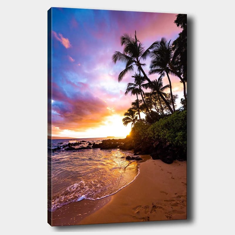 Canvastavla 70x100 cm - Solnedgång vid stranden med palmer som ramas in av färgglada moln, Lila / Orange / Grön