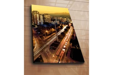 Canvastavla 70x100 cm - Stadssilhuett vid skymning med ljus från byggnader och trafik - Guld / Mörkblå / Vit - Inredning - Tavlor & posters - Canvastavla