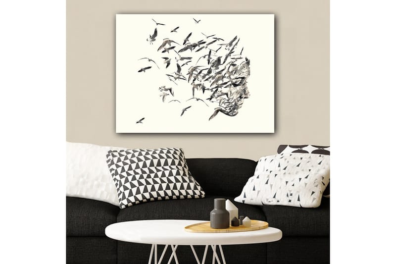 Canvastavla 70x100 cm - Stiliserad ansiktsprofil som smälter samman med flygande fåglar, Grå / Svart / Beige