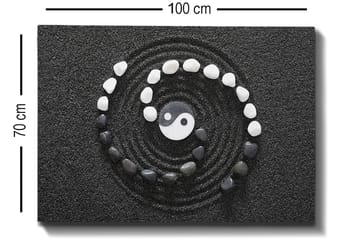 Canvastavla 70x100 cm - Stiliserad yin-yang-symbol omgiven av svarta och vita stenar i en spiralformad komposition - Svart / Vit - Inredning - Tavlor & posters - Canvastavla