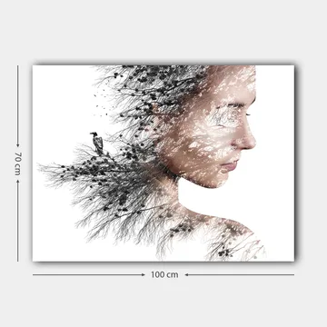 Canvastavla 70x100 cm - Stiliserad porträtt av en kvinna med träd och fåglar som en del av hennes silhuett - Svart / Grå / Brun - Inredning - Tavlor & posters - Canvastavla