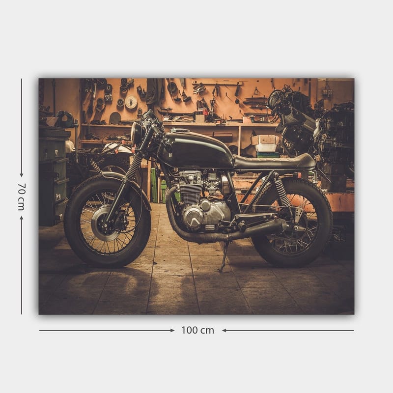 Canvastavla 70x100 cm - Stilren motorcykel i en verkstadsmiljö - Svart / Grå / Silver - Inredning - Tavlor & posters - Canvastavla
