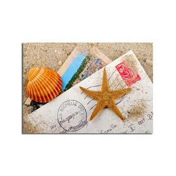 Canvastavla 70x100 cm - Strandinspirerad komposition med en sjöstjärna och snäckskal på ett postkort - Orange / Beige / Vit - Inredning - Tavlor & posters - Canvastavla