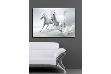 Canvastavla 70x100 cm - Två vita hästar som galopperar framåt i en dynamisk rörelse - Vit / Grå - Inredning - Tavlor & posters - Canvastavla