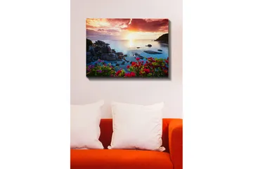 Canvastavla 70x100 cm - Vacker solnedgång över havet med klippor och färgglada blommor i förgrunden - Rosa / Blå / Orange - Inredning - Tavlor & posters - Canvastavla