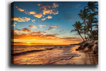 Canvastavla 70x100 cm - Vacker solnedgång vid en strand med palmer och mjuka vågor som rullar in mot sanden - Orange / Blå / Beige - Inredning - Tavlor & posters - Canvastavla