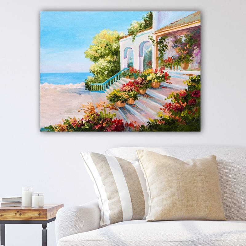 Canvastavla 70x100 cm - Vacker trädgård med blommor och en trappa som leder ner mot havet, Blå / Grön / Röd