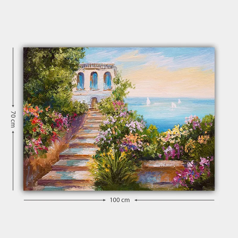 Canvastavla 70x100 cm - Vacker trappa omgiven av färgglada blommor som leder ner till havet och en byggnad med blå fönster - Grön / Rosa / Blå - Inredning - Tavlor & posters - Canvastavla