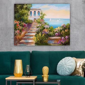 Canvastavla 70x100 cm - Vacker trappa omgiven av färgglada blommor som leder ner till havet och en byggnad med blå fönster - Grön / Rosa / Blå - Inredning - Tavlor & posters - Canvastavla
