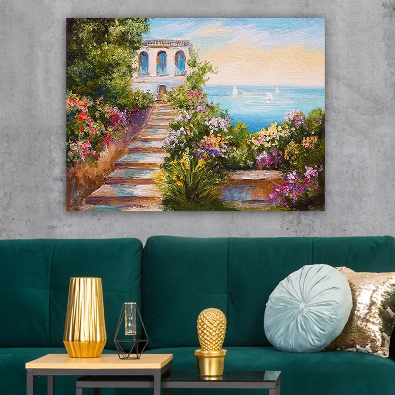 Canvastavla 70x100 cm - Vacker trappa omgiven av färgglada blommor som leder ner till havet och en byggnad med blå fönster - Grön / Rosa / Blå - Inredning - Tavlor & posters - Canvastavla
