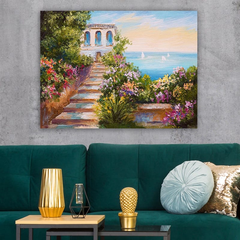 Canvastavla 70x100 cm - Vacker trappa omgiven av färgglada blommor som leder ner till havet och en byggnad med blå fönster - Grön / Rosa / Blå - Inredning - Tavlor & posters - Canvastavla