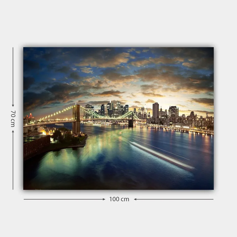 Canvastavla 70x100 cm - Vacker vy över en stad med en bro som sträcker sig över en glittrande flod vid skymning - Blå / Grön / Orange - Inredning - Tavlor & posters - Canvastavla