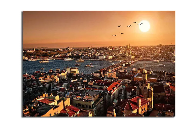 Canvastavla 70x100 cm - Vacker vy över Istanbul vid solnedgång, med takåsar och båtar på vattnet, Orange / Röd / Blå