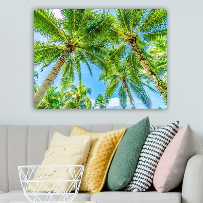 Canvastavla 70x100 cm - Vy av höga palmer som sträcker sig mot en klar blå himmel - Grön / Blå - Inredning - Tavlor & posters - Canvastavla